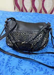 Black And Golden Juicy Couture Sling Bag