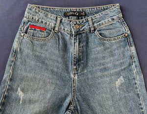 Distressed Wide Leg Denim Jeans