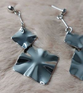 Statement Silver Danglers