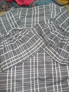 grey and white tunic
