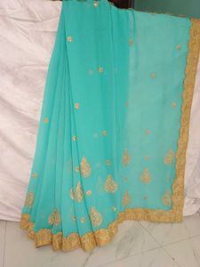 Elegant Aqua Georgette Saree with Zari Work