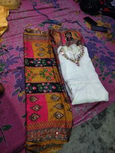 white gawn and colorfull duppata