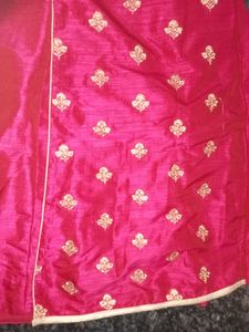 A Small Hand worked Gown