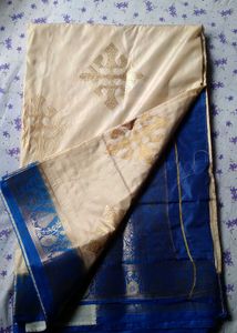 PUJA WEAR GORGEOUS WHITE AND ROYAL BLUE SAREE