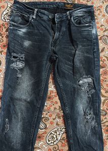 Distressed Wash Denim Jeans