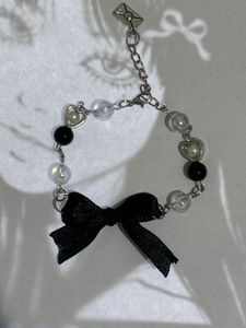 CUTE BOW/RIBBON COQUETTE ADJUSTABLE CHARM BRACELET