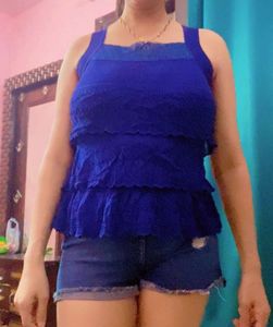 blue thick net top with  hot pa