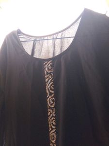 Black Skirt with Embroidered Hem