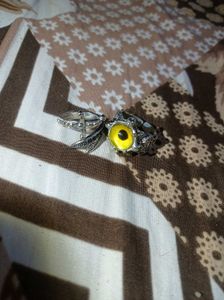 Uniquely Yellow Coloured Eye Silver Sword Ring