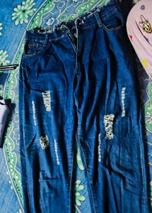 Ripped Blue Denim Jeans