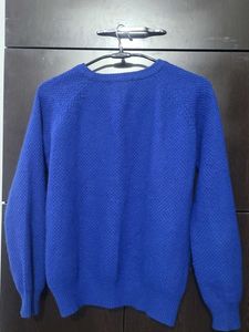 Branded Almost new -Blue Self design Sweater.