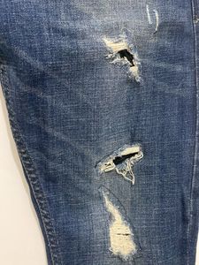 Ripped Blue Denim Jeans