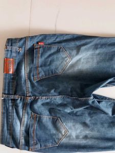 Distressed Denim Jeans