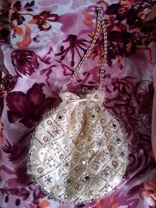 Extremely Luxurious Gold Pouches And Potlis