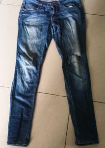 Distressed Denim Jeans