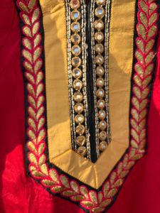 Red Embroidered Kurti With Salwar And Dupatta.
