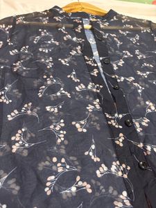 Navy blue with peach floral design shirt