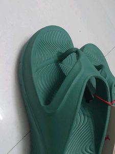 Branded Green flip-flops