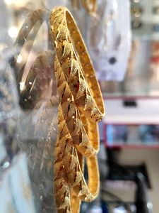 gold plated bangles (4pcs)