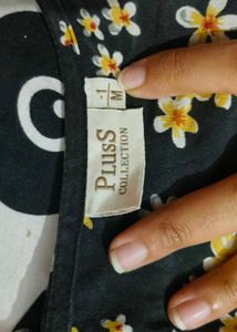 Black dress with yellow n white flowers