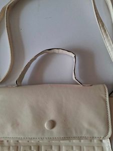 Light Pink Handbag and cream Slingbag