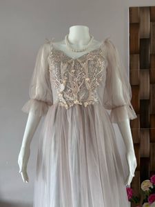 Faint pink tulle gown