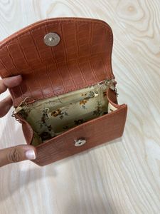 2 (brown/black) sling Crossbody Bag