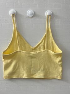 Cute yellow ribbed crop tank top.