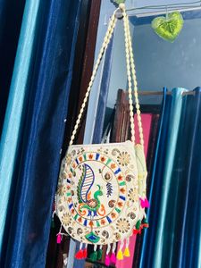 Peacock Charm Embroidered Sling