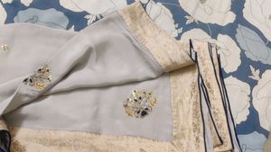 Grey saree with gold border
