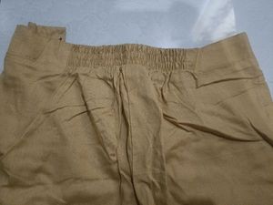 Yellow Fabrics Women&#39;s Narrow Trousers, Size- L/XL, Botton And Zipper Closure In Front And Elasticated Waistband At Back