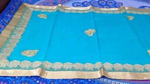 Teal Saree with Gold Embellishments