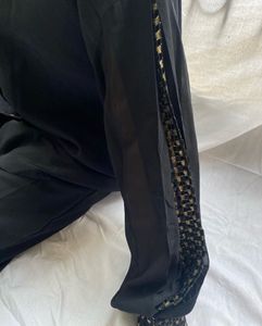 Black Shirt with quilt detail on sleeve