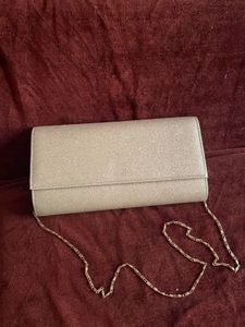 Sparkling Silver Clutch cum sling with chain👛