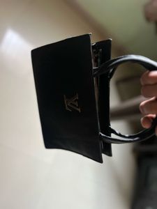 Chic Black Handbag with Logo Detail