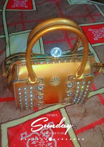 Golden Bag Bilkul Now Diamond Work