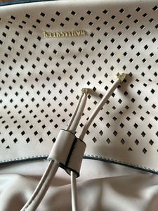 Beige colour big handbag bag