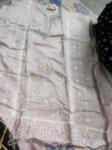 Unstitched Embroidered Dress Material