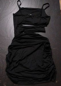 Sleek Black Cutout Bodycon Dress. Size :- M
