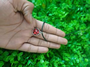 Sasuke Mangekyou Sharingan Chain Or Necklace.