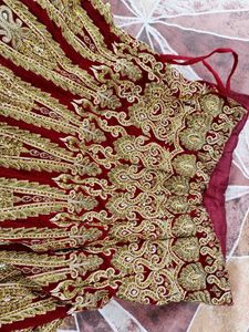 Red Bridal Lehenga With Beautiful Golden Work