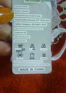 Unisex Lacy White Thong with Charm