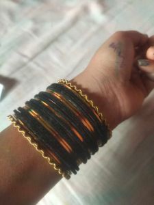 golden and black bangles
