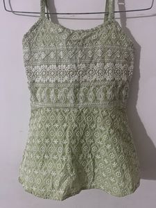 PEPLUM EMBROIDERED SLEEVLESS TOP