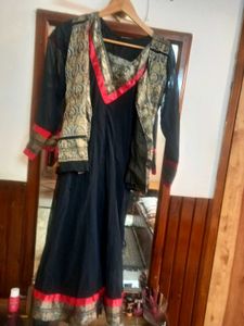 It Is A Frock Style Kurta With Straight Jacket