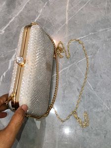 Elegant Silver Clutch with Chain Strap