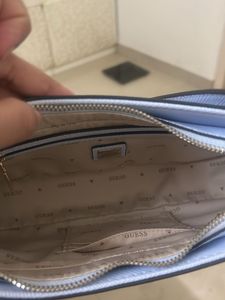 GUESS Women Solid Half Moon Fringed Shoulder bag