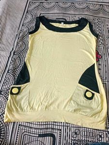 Beautiful Seleveless Top In Yellow Black Colour
