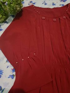 Burgundy blouse with pearl detail
