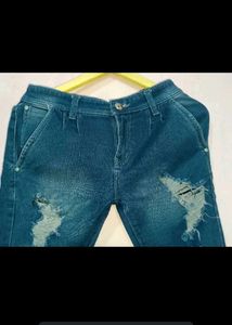 Ripped Blue Denim Jeans